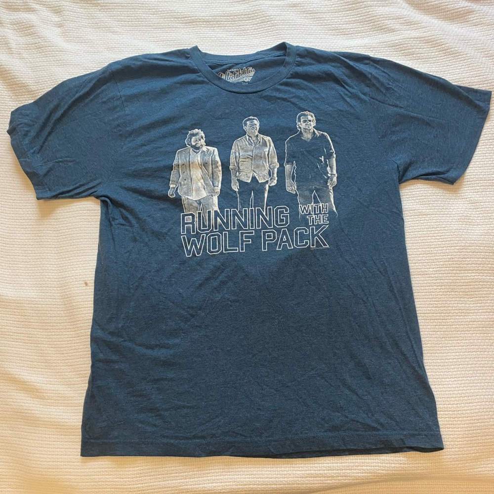 (Collectabilities) blue t-shirt.